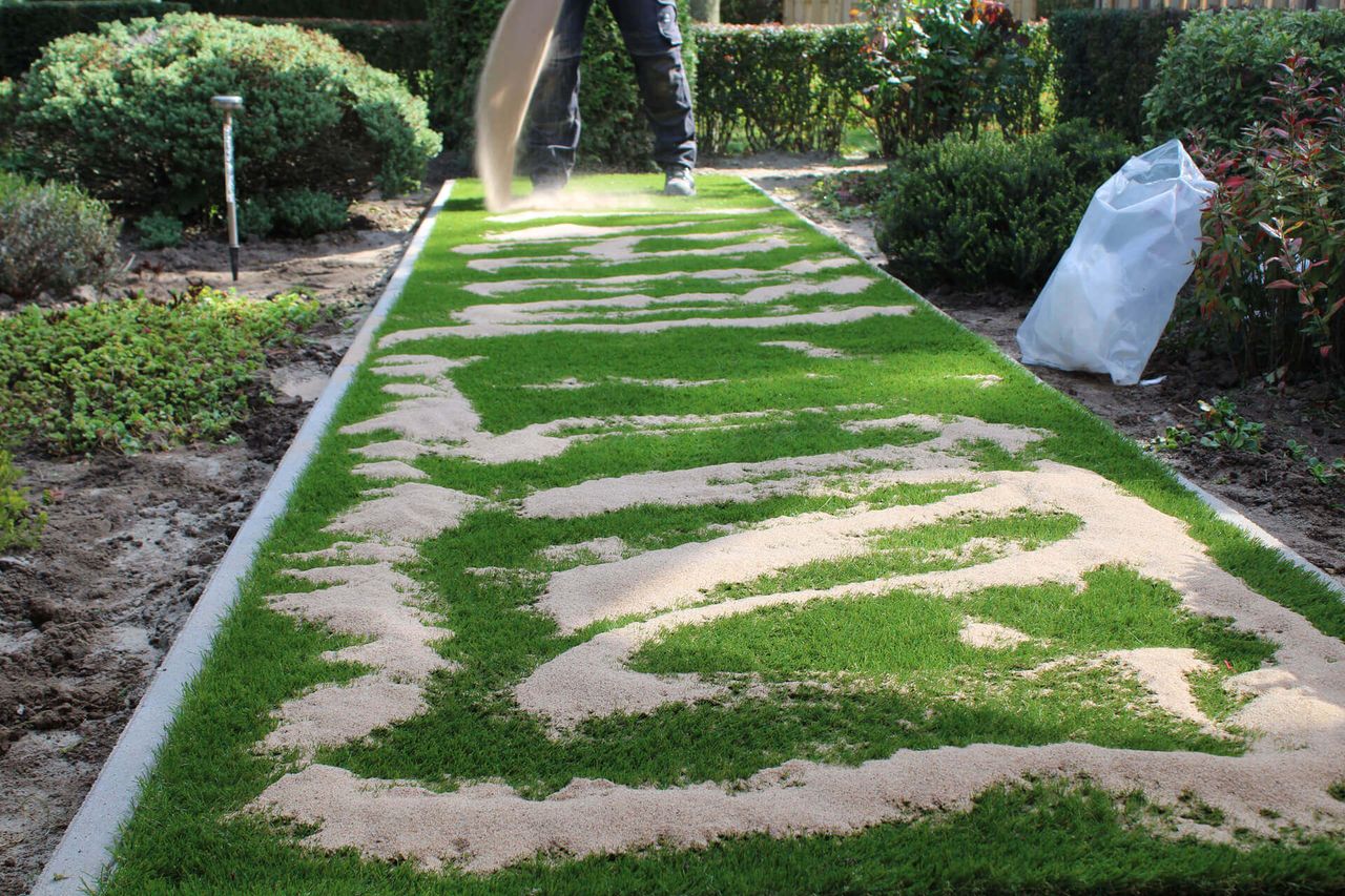 kunstgras haken zand